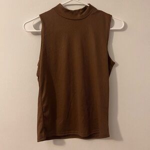 3 pack sleeveless mock neck shirts.